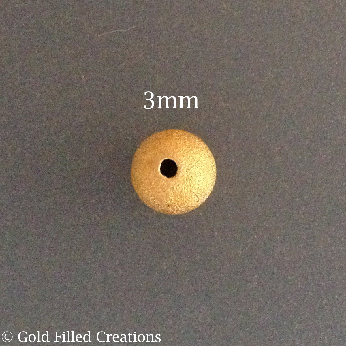 Gold stardust beads 3mm